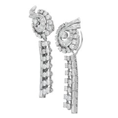 A pair of vintage day-to-night diamond earrings