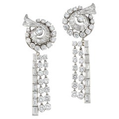 A pair of vintage day-to-night diamond earrings