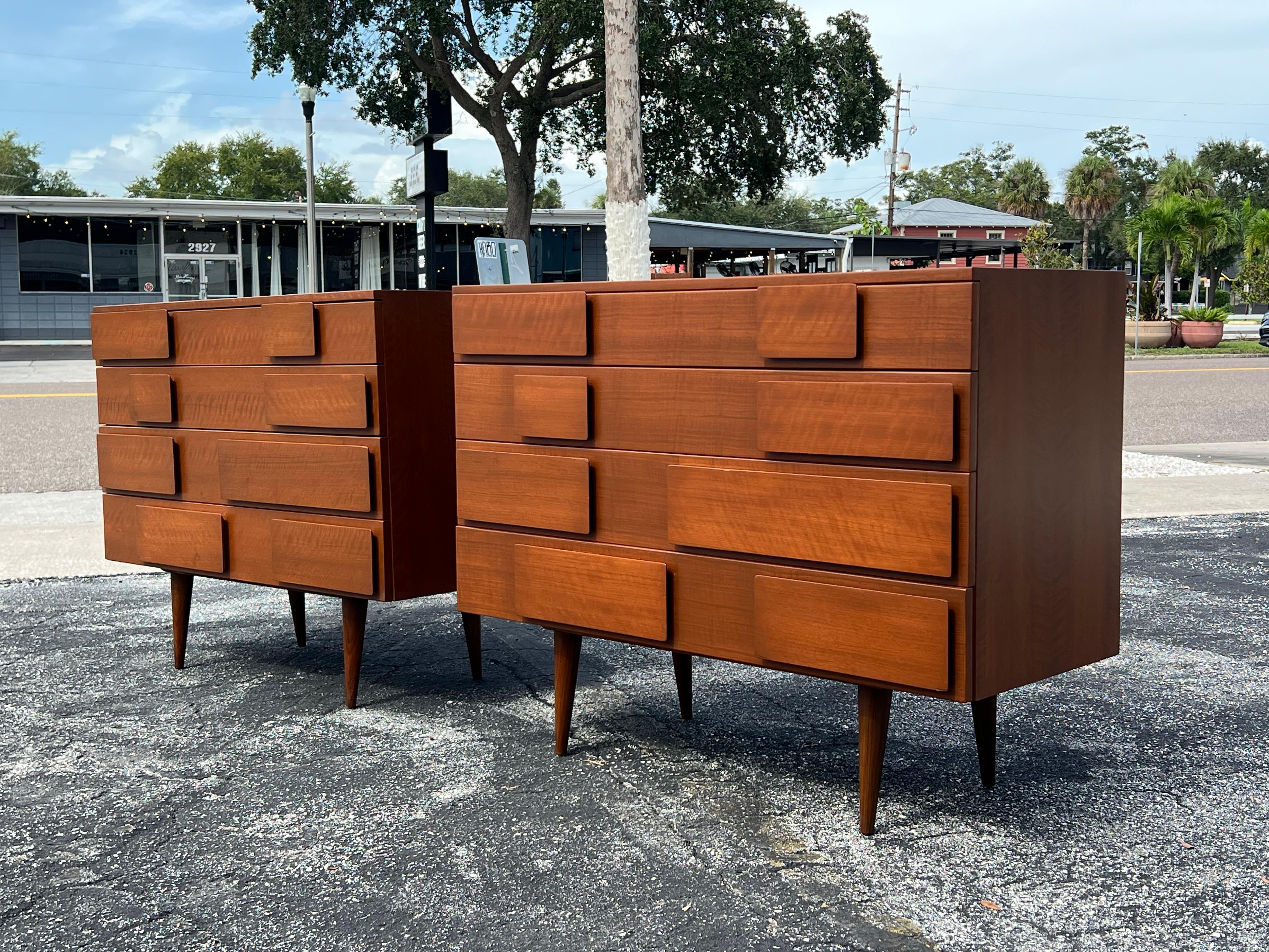 A pair of four drawer chests designed by Gio Ponti for Singer &Sons. Made in walnut ca' 1950's. Both signed. 