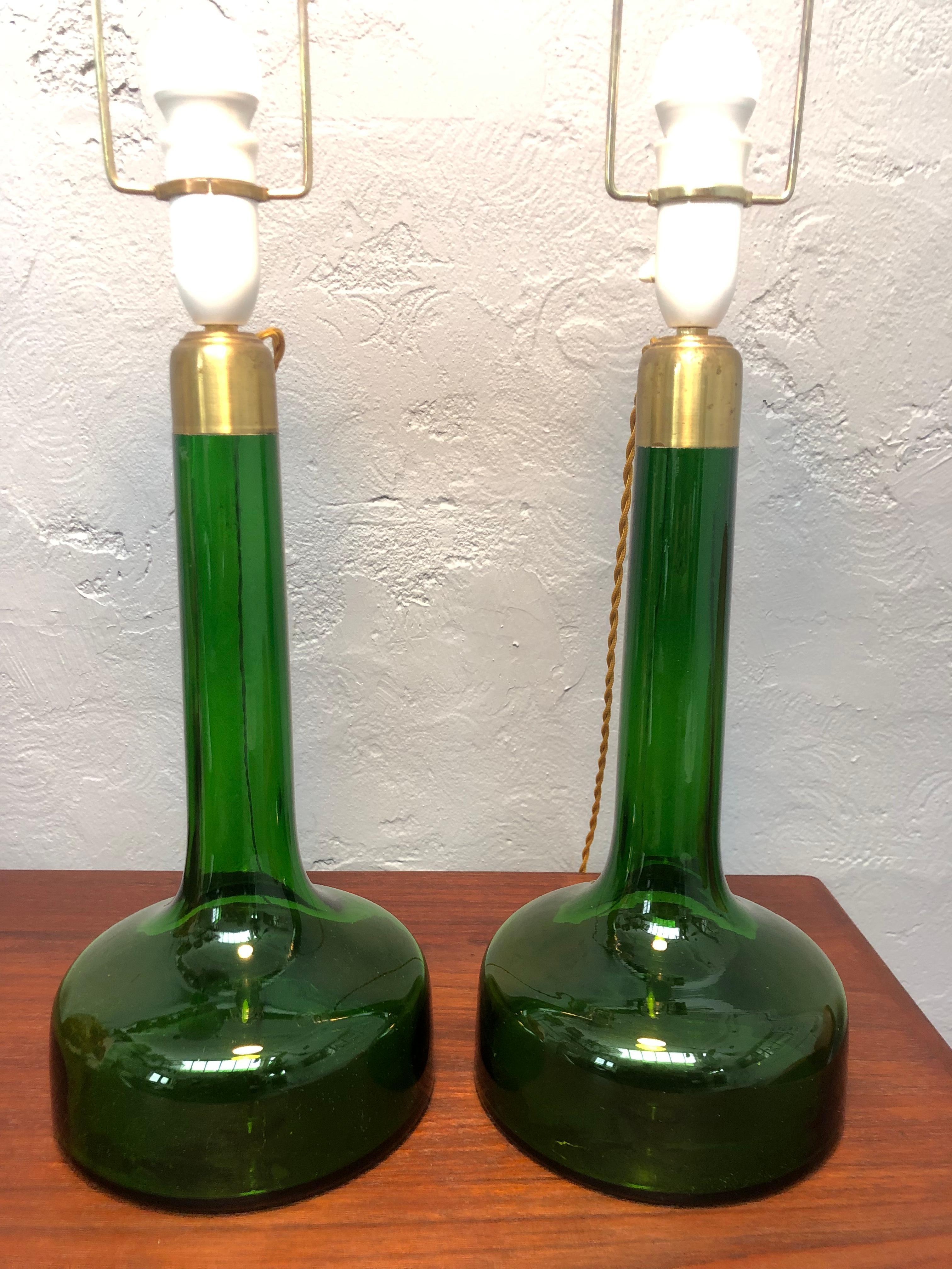 A vintage pair of hand blown glass table lamps designed by Biilman-Petersen for Le Klint of Denmark in 1948. 
Can be fitted with an EU UK or US plug. 
Lampshade not included but can be purchased. 
Gunnar Biilmann Petersen is one of the great figures