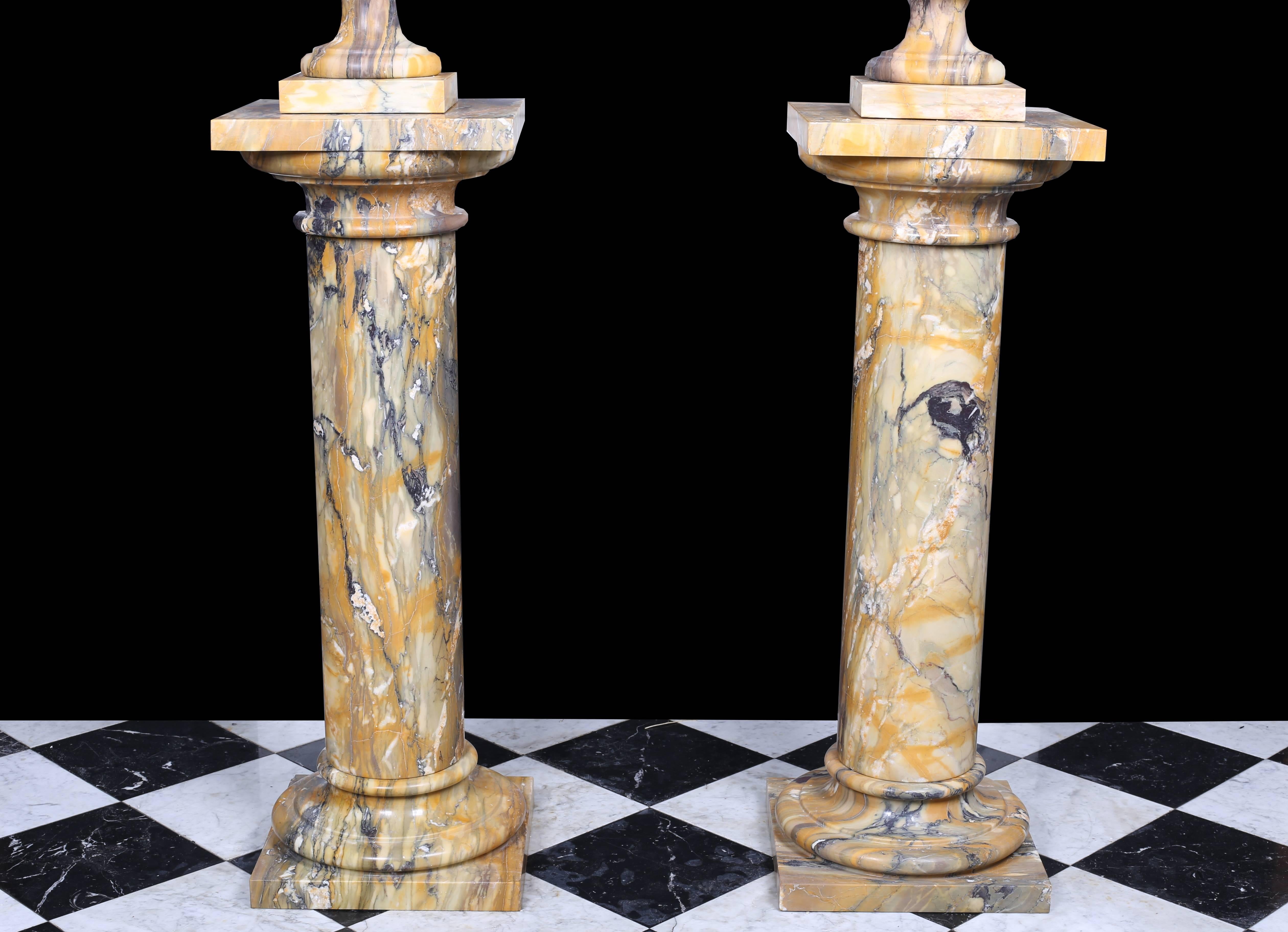 Pair of Vintage Grand Marble Urns on Column Plinths in the Neoclassical Style In Excellent Condition For Sale In London, GB