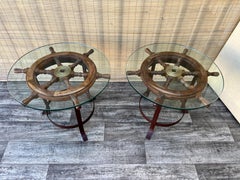 A pair of Vintage Handcrafted Ship's Wheel Glass Top Side Tables. Circa 1970s