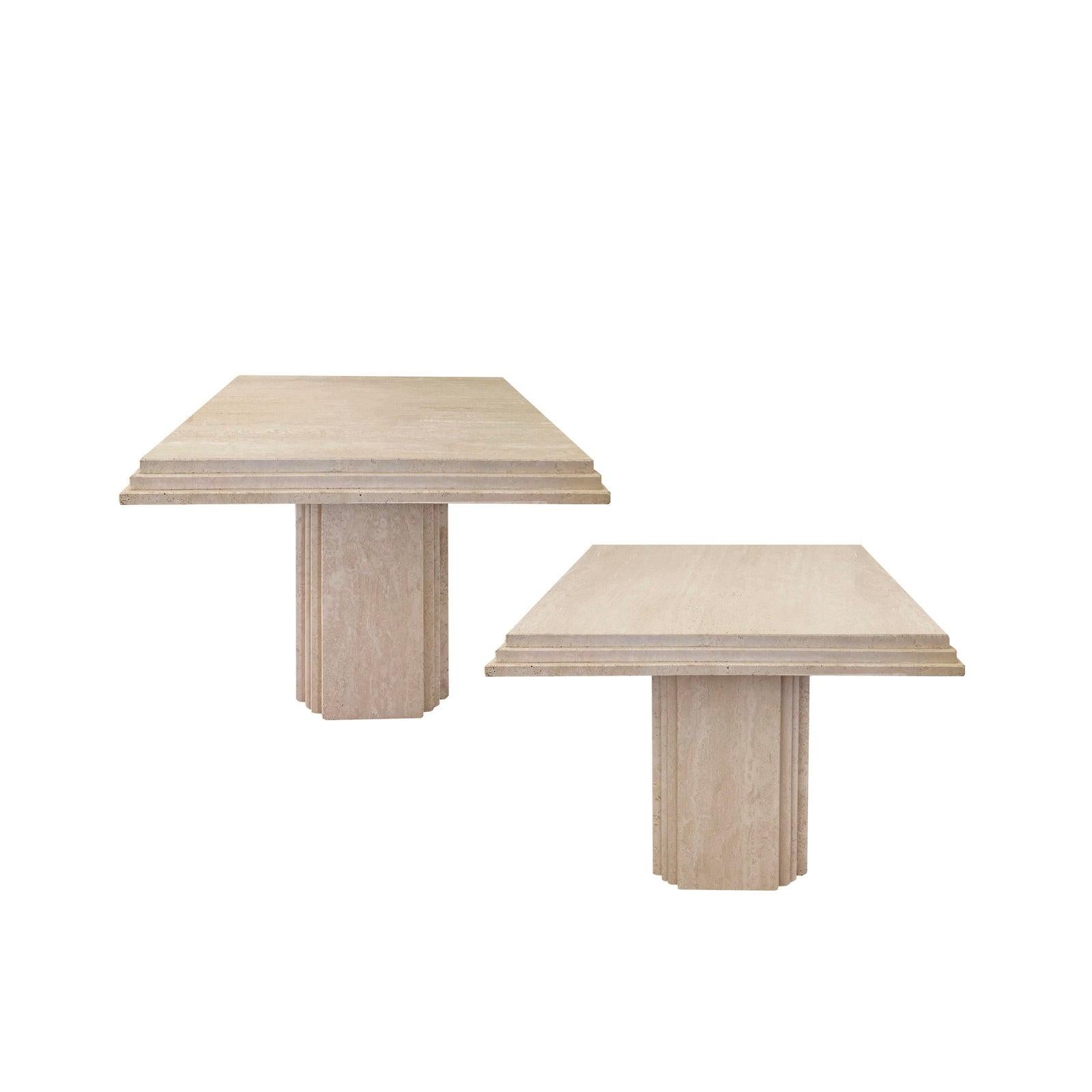 A pair of beautiful 1980s vintage travertine sculptural coffee tables or side tables. Overall in good condition with minor wear and tear for their age. The tables are in honed travertine, not polished. In addition, the tops come off the bases unless