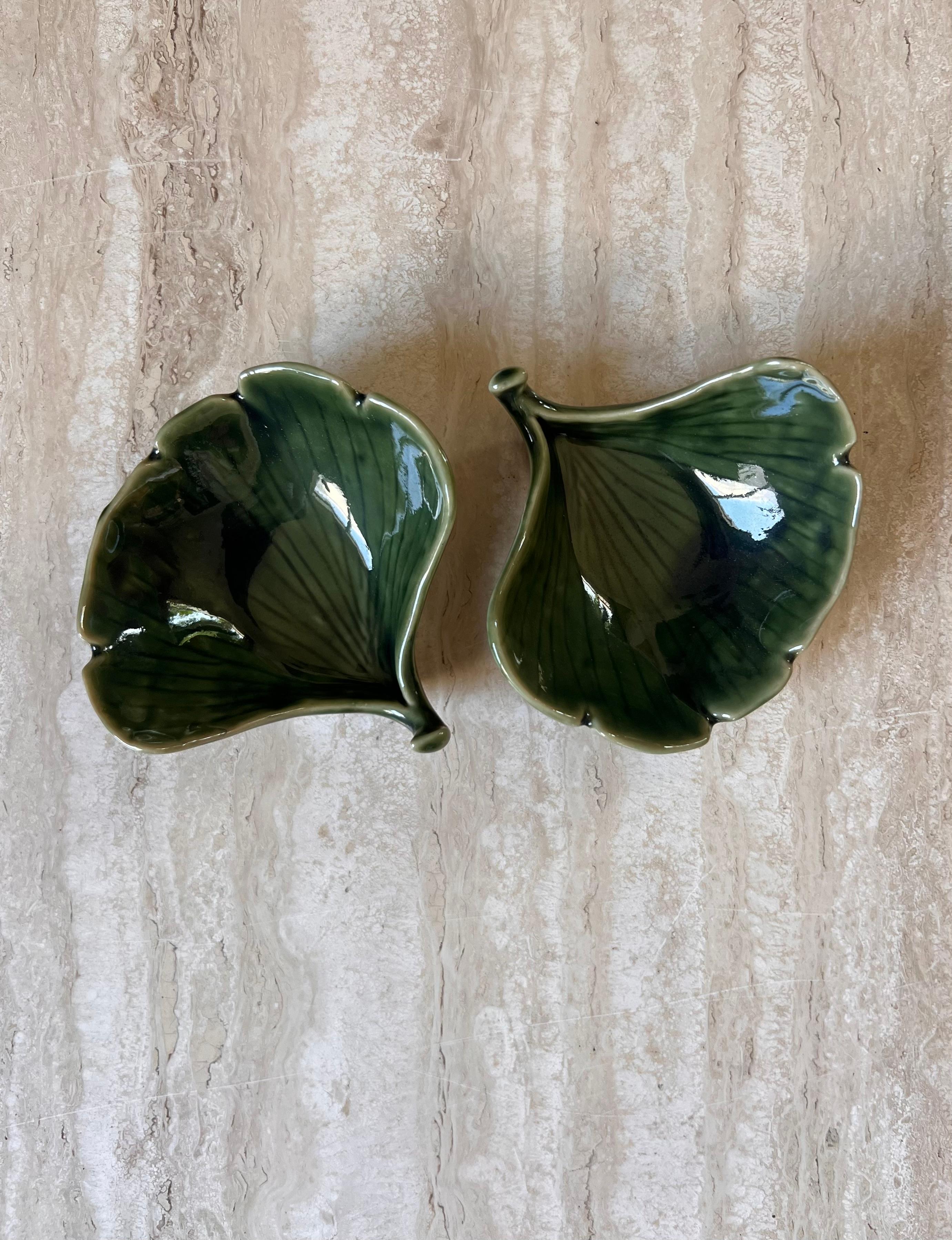 A pair of small vintage Japanese ceramic leaf dishes, 20th century. To hold soy sauce and wasabi, or perhaps even olives or nuts on a larger spread. Shown in later pics with longer Japanese leaf dishes, also available in store - I am happy to bundle