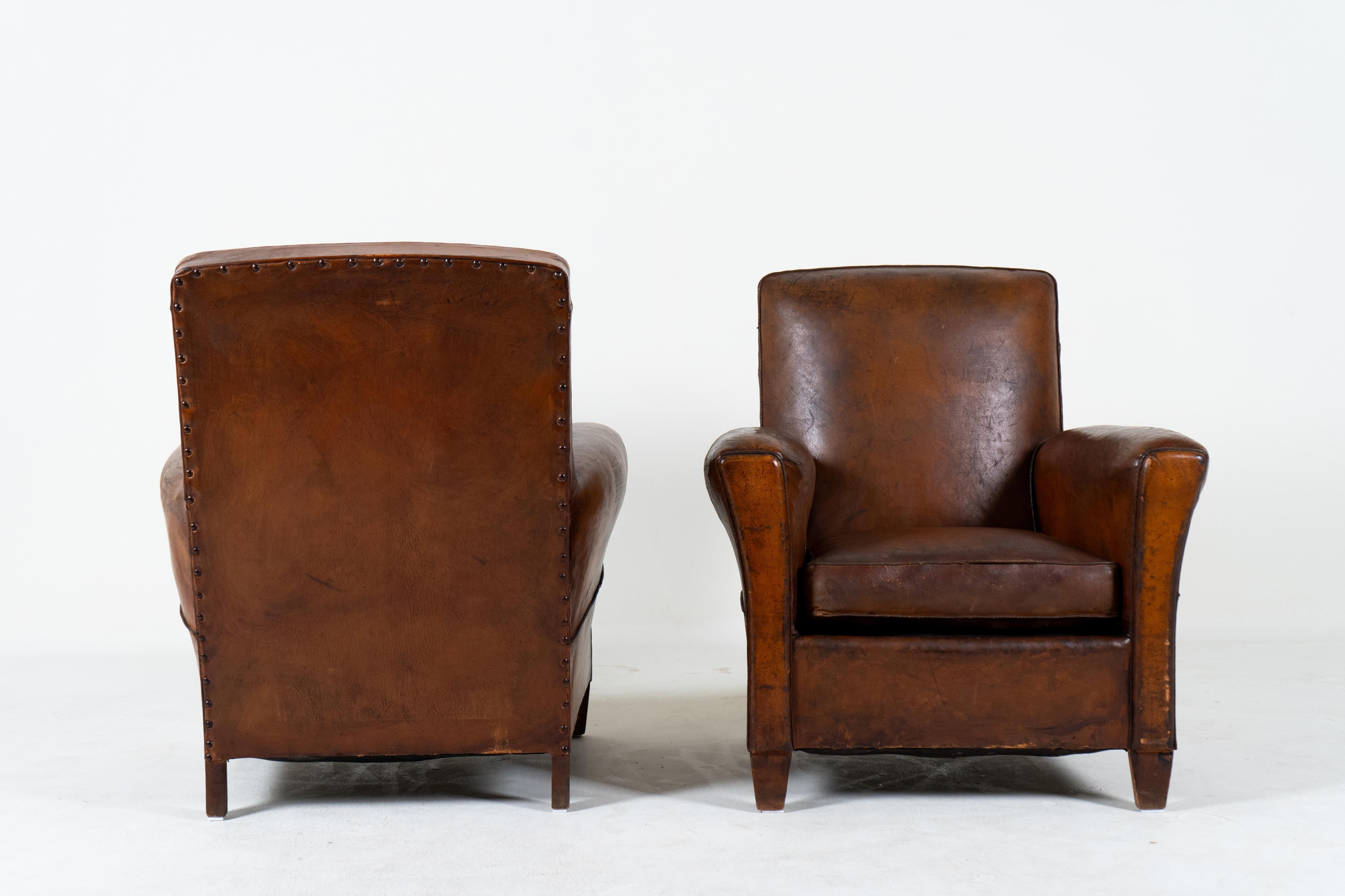 A Pair of Vintage Leather Club Chairs, France c.1950 In Fair Condition For Sale In Chicago, IL