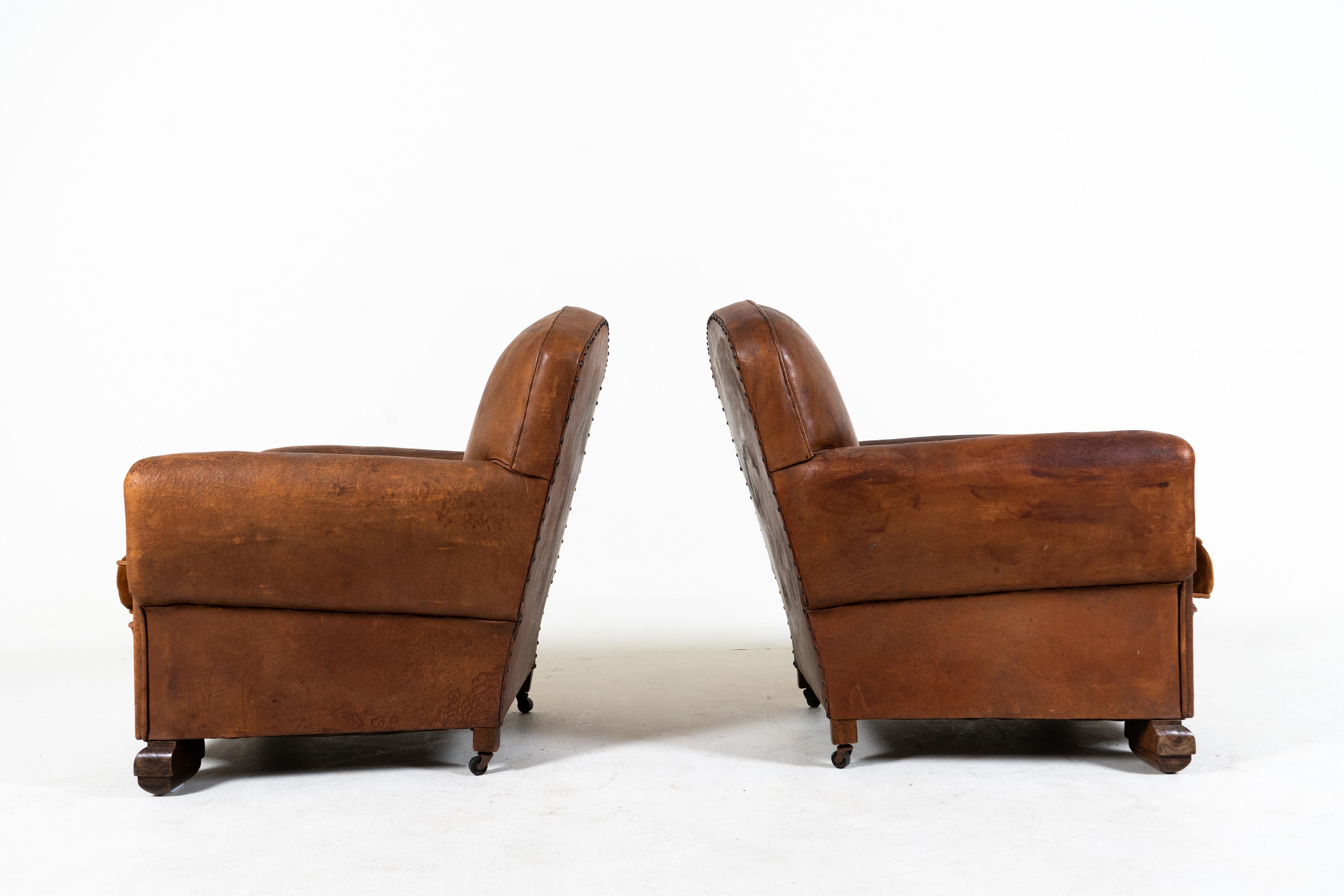 A Pair of Vintage Leather Club Chairs, France c.1950 In Good Condition For Sale In Chicago, IL