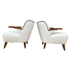 A pair of vintage mid-century Beech wood Boucle wool fabric lounge chairs France