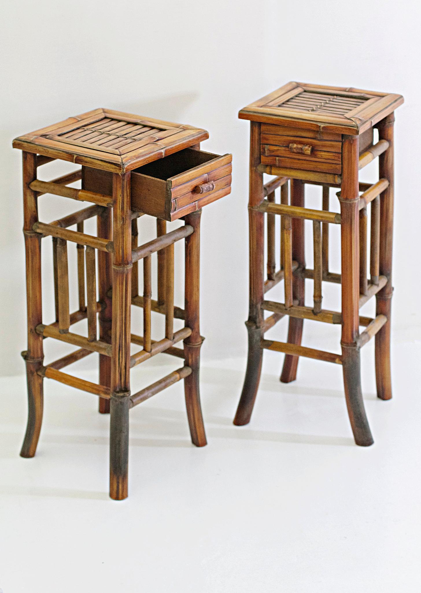 A pair of handmade elegant and sleek nightstands in bamboo. Each has one-drawer at the top.