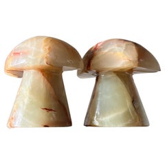 A pair of vintage onyx mushroom bookends, 20th century