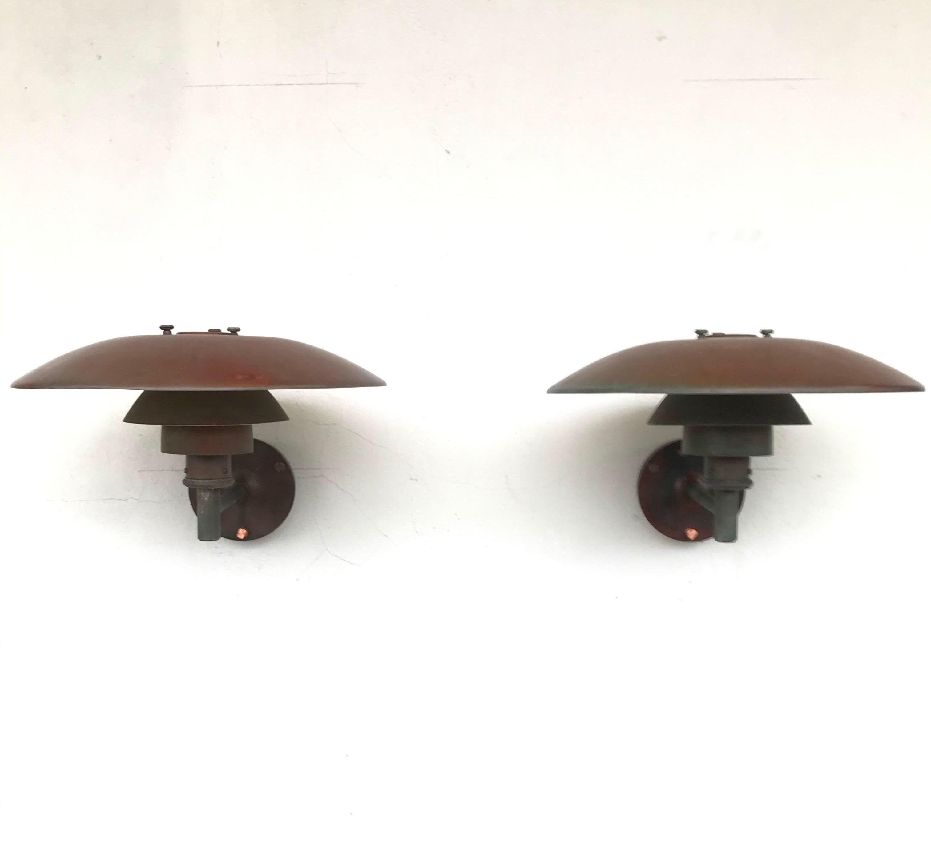 Poul Henningsen copper wall lamps PH 4.5 made in Denmark by Louis Poulsen from the 1980s
This iconic lamp was first designed in 1966 and has been a Classic ever since
This pair of lamps are in original condition with lovely Verdigris, patina and