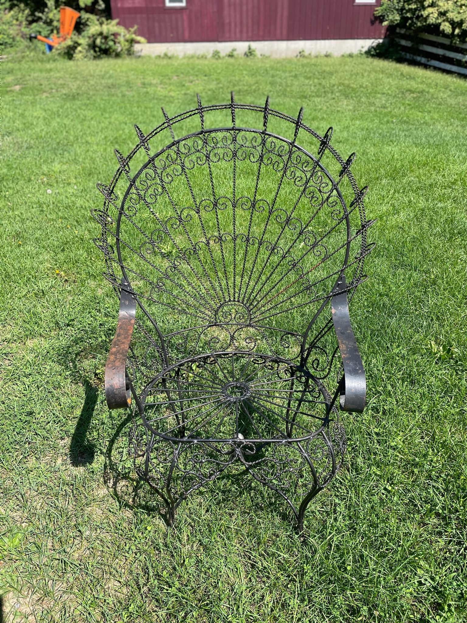 A pair of vintage salterini peacock chairs
In stock and ready to ship
Gorgeous set of twisted iron fan back peacock chairs by Salterini. Perfect for any deck, garden, or patio. Can be sandblasted and powdercoated to offer years of protection of your