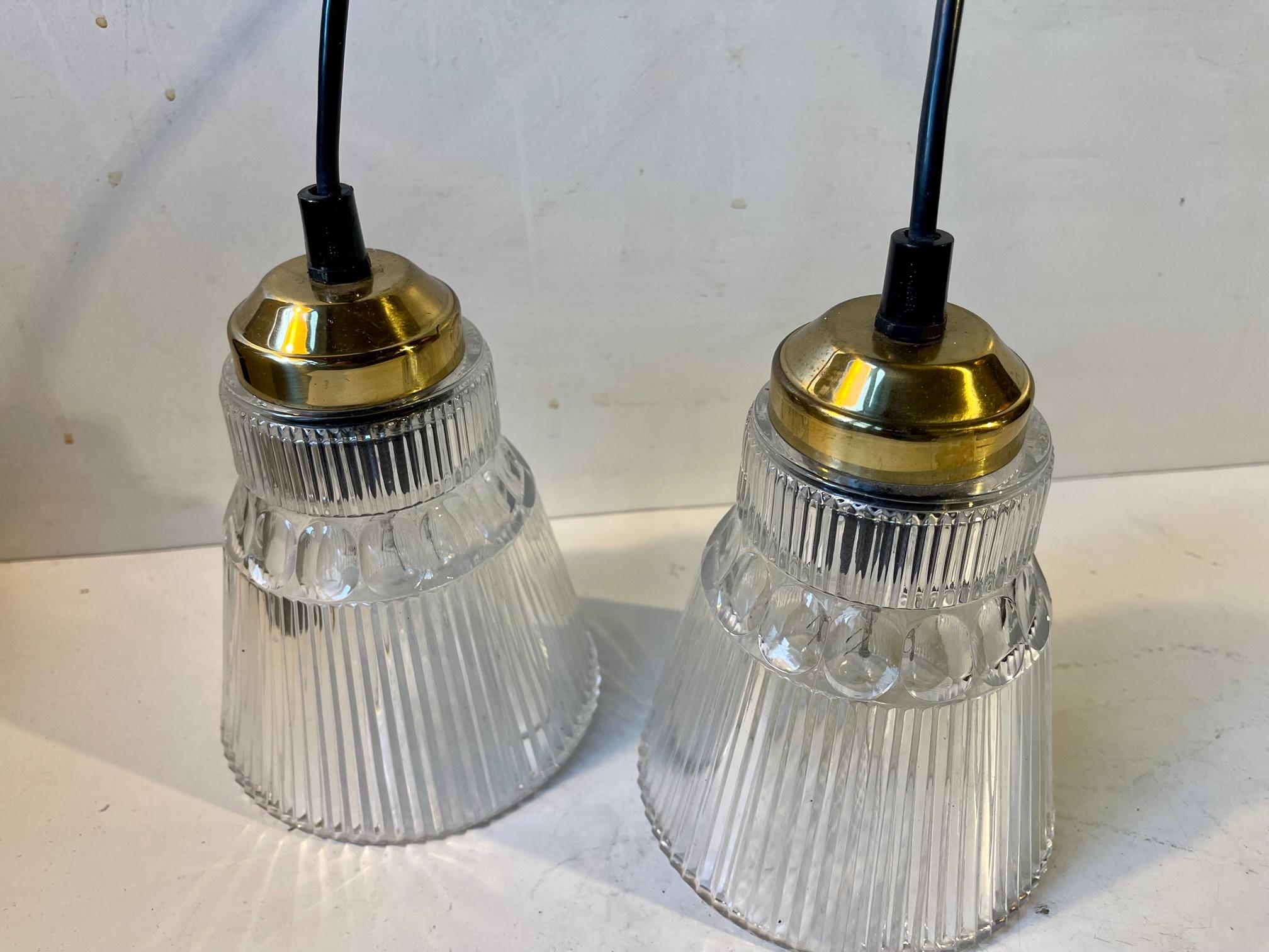 A pair of Vintage Scandinavian Pendant Ceiling Lights in Glass and brass 2