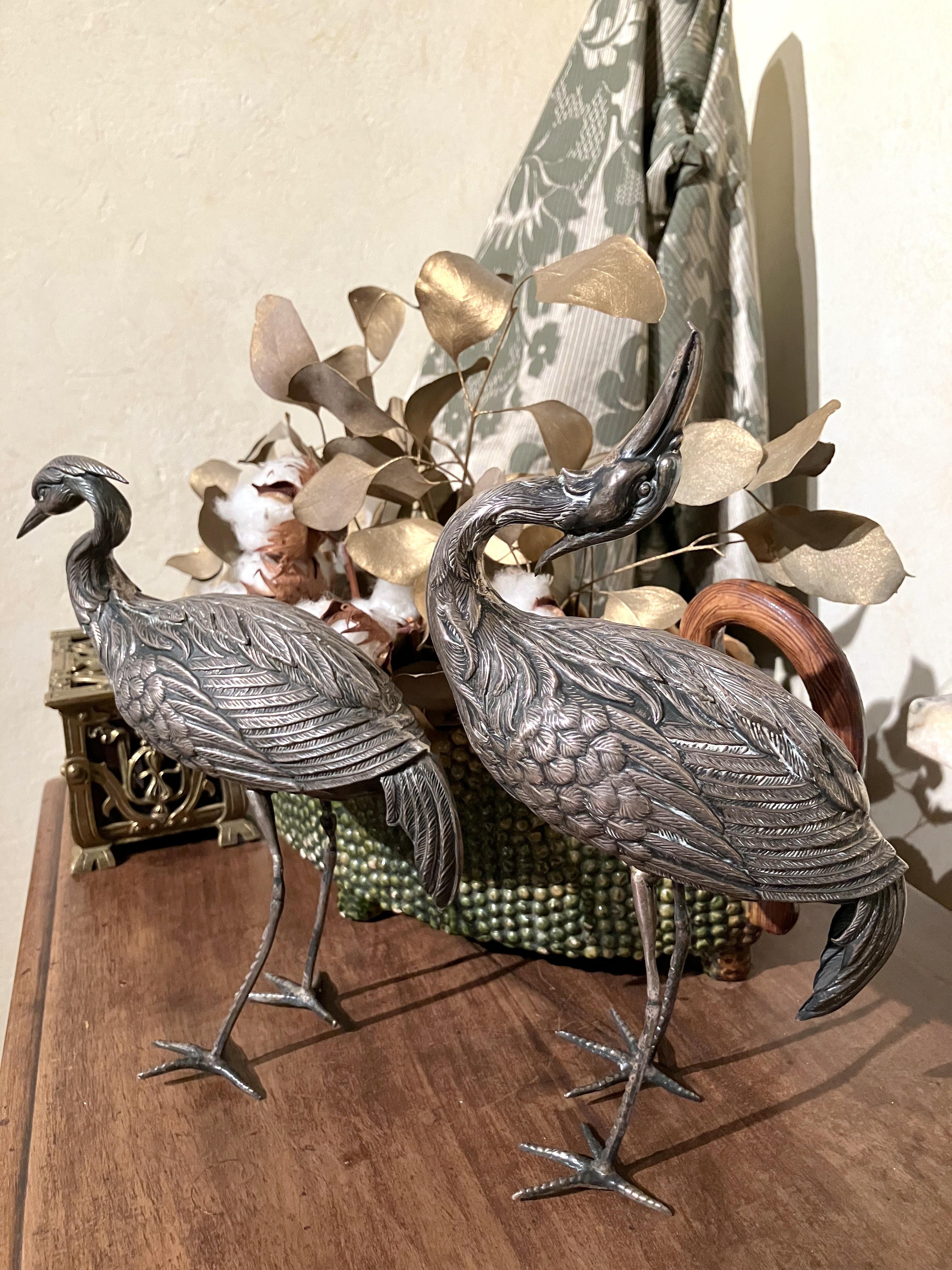This lovely pair of vintage hand crafted Silver Herons sculptures can be dated to the early 20th century. These tiny statuettes are natural decorative elements that recall the art nouveau period and the aesthetic movement
Expertly crafted with