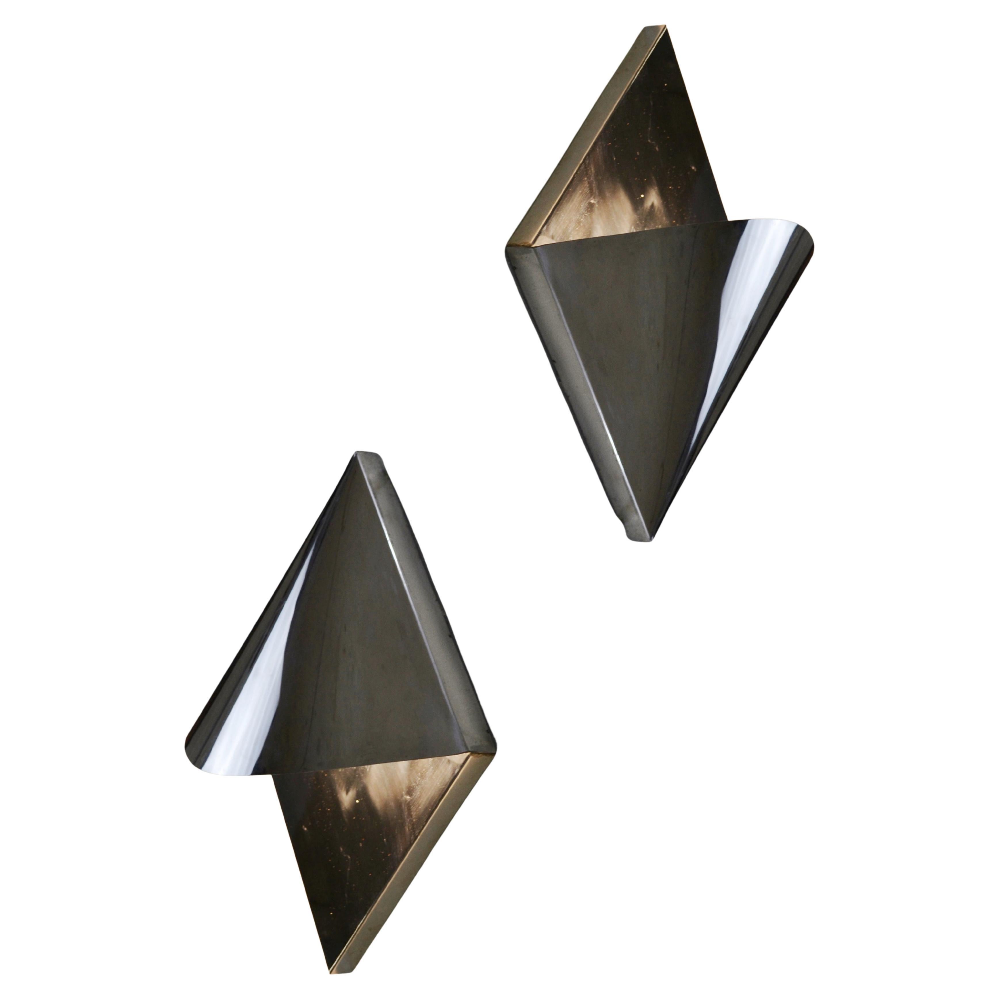 A pair of vintage wall sconces from the 1970s - France.