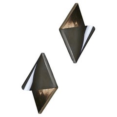 A pair of vintage wall sconces from the 1970s - France.