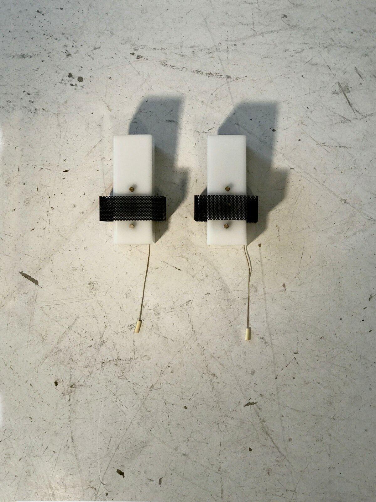 A Pair of WALL APPLIQUES SCONCES in the style of ROBERT MATHIEU, France 1950 In Good Condition For Sale In PARIS, FR
