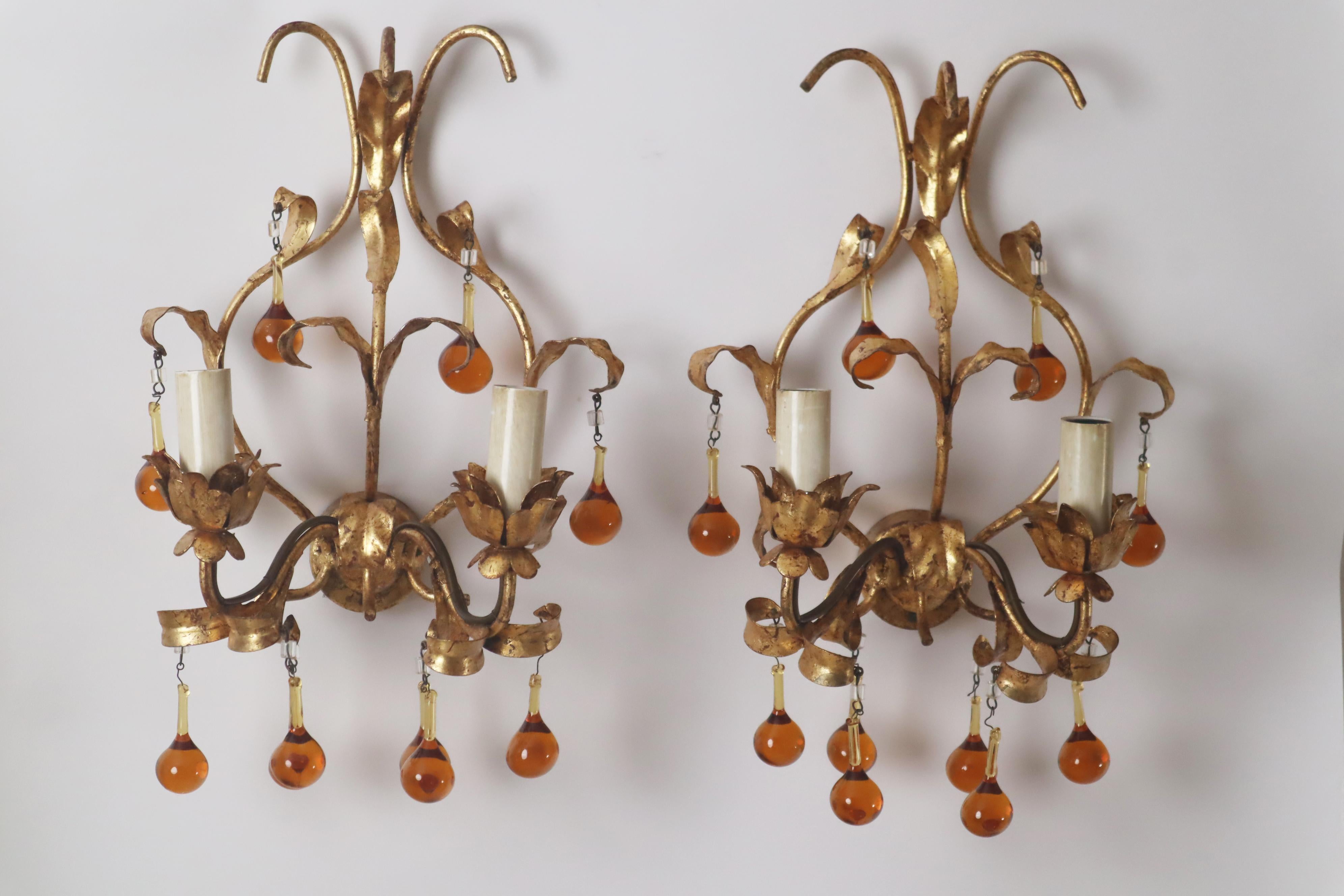Metal A pair of wall lamps with dropping crystal glass. italy, 1960s For Sale