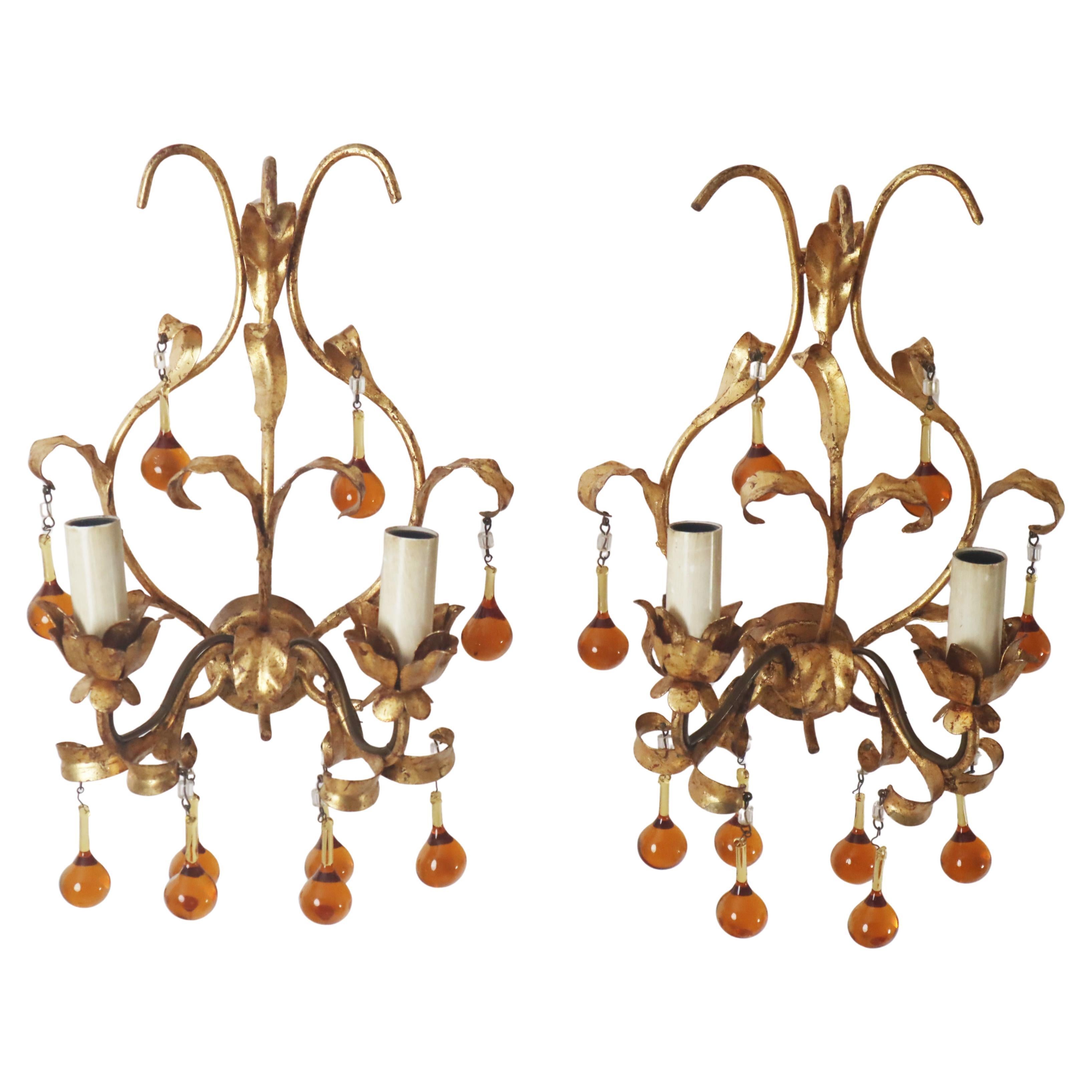 A pair of wall lamps with dropping crystal glass. italy, 1960s For Sale