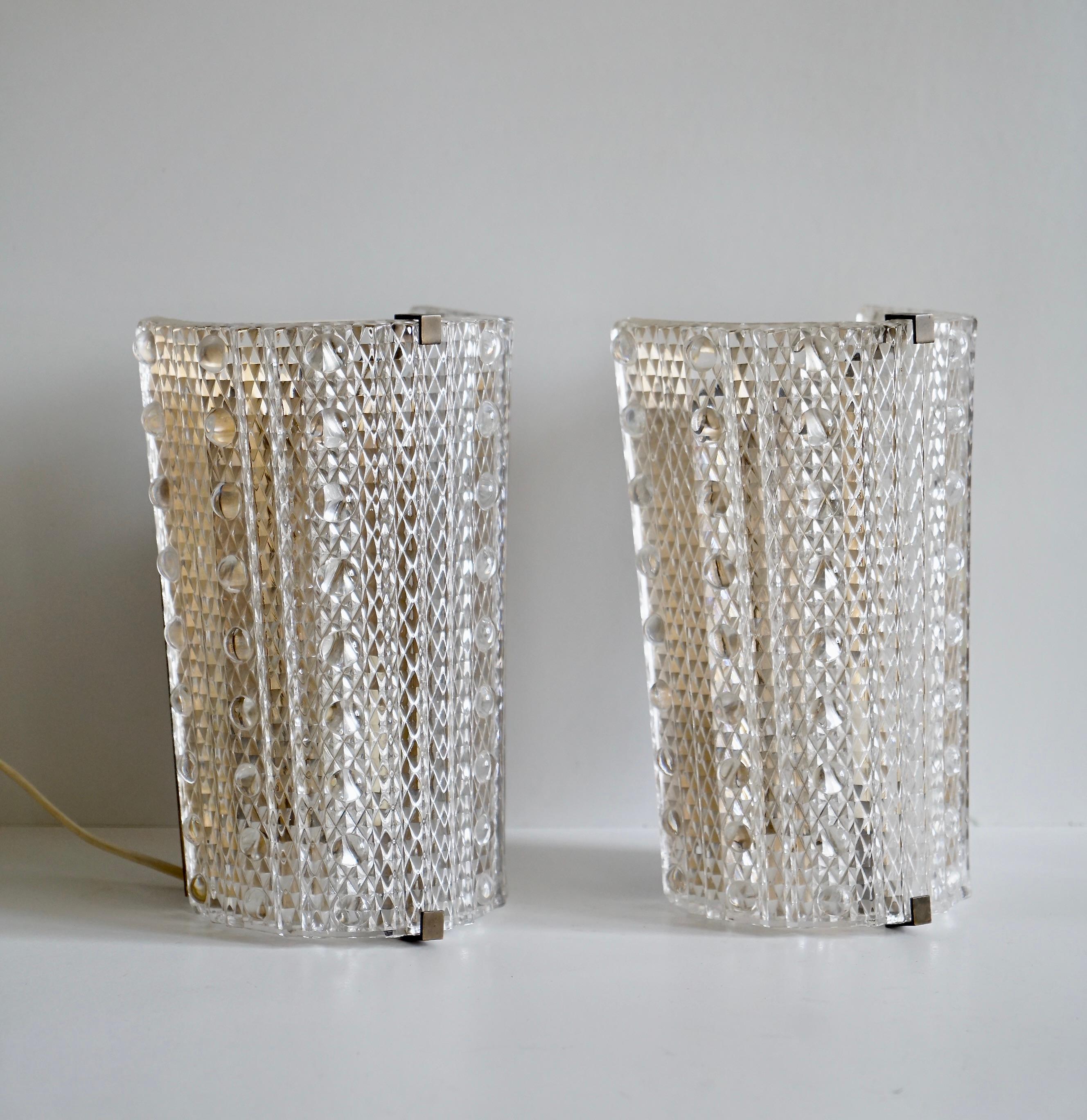Scandinavian Modern A pair of wall lights by Orrefors / 2 pairs available For Sale