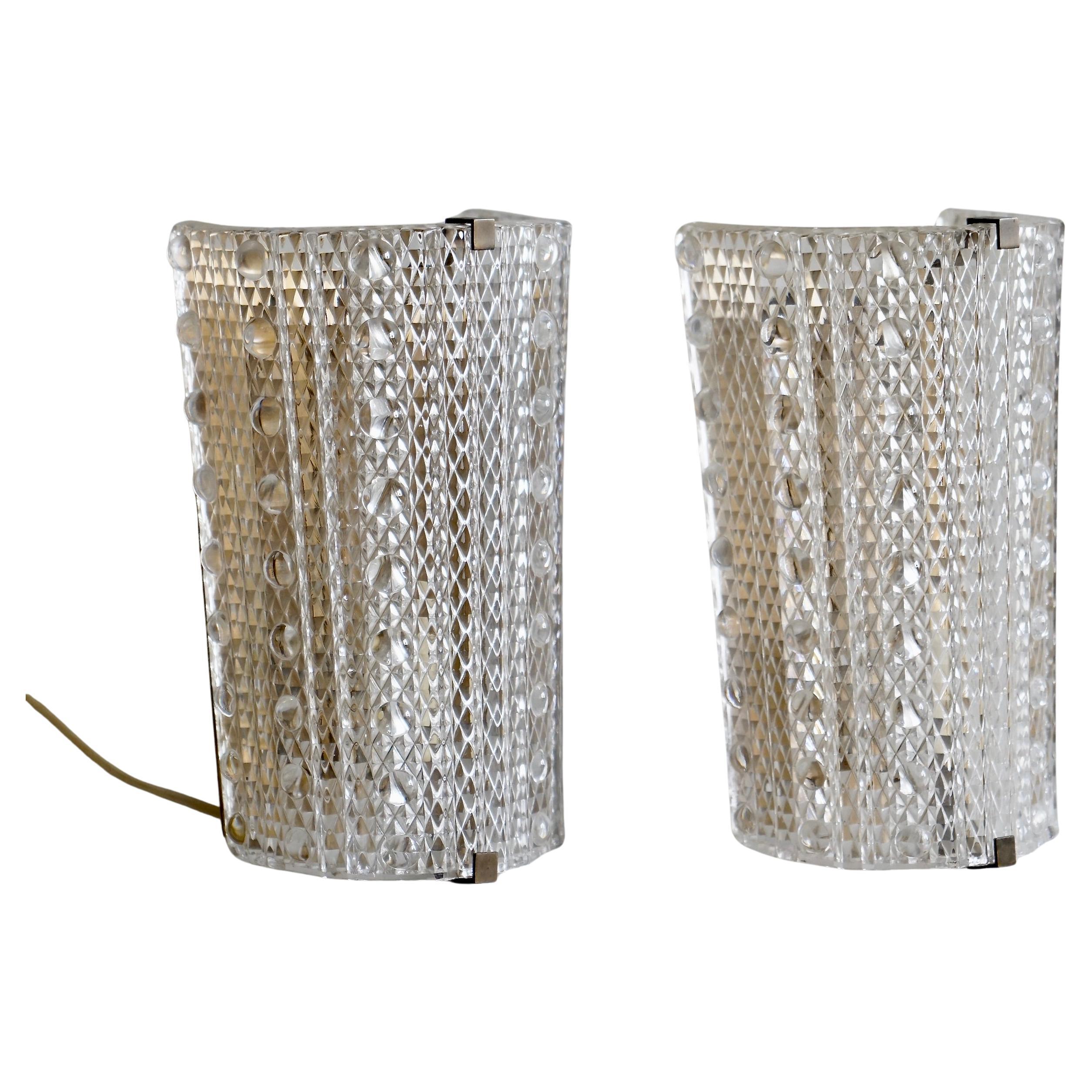 A pair of wall lights by Orrefors / 2 pairs available