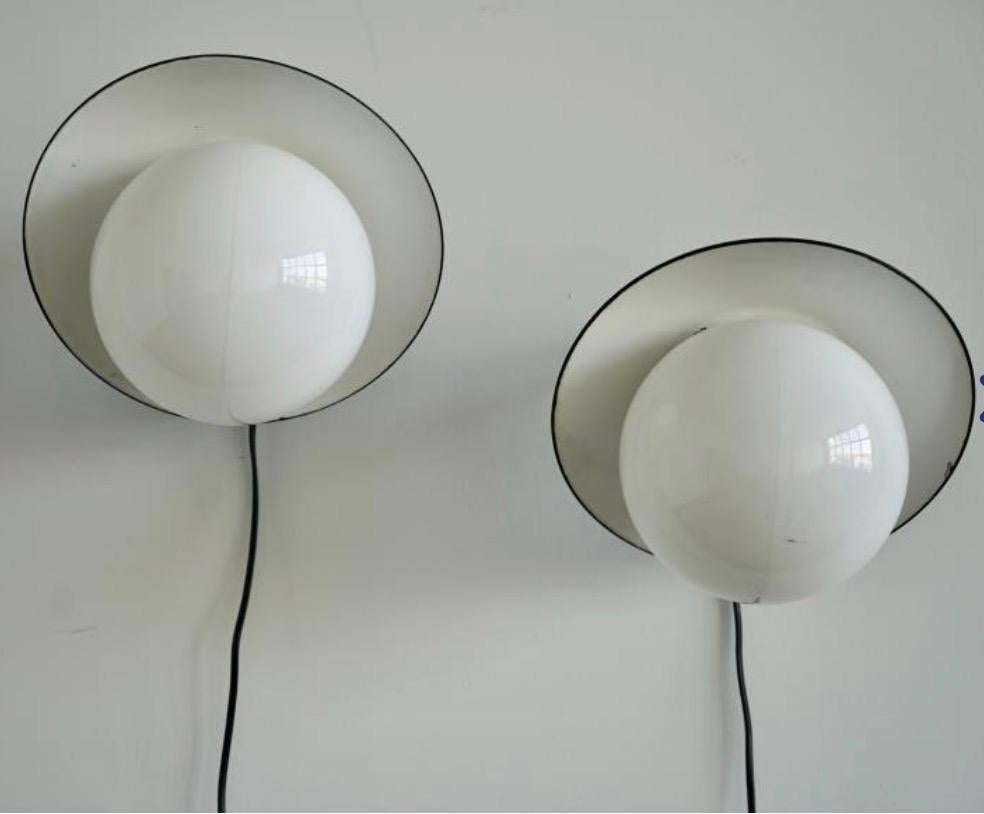 Finnish A pair of wall lights by Paavo Tynell for Taito Oy. For Sale