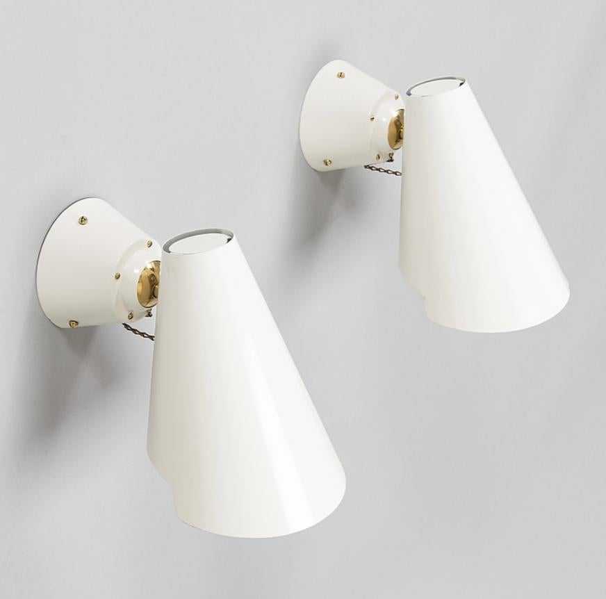 Scandinavian Modern A pair of wall lights by Paavo Tynell, model 2351. For Sale