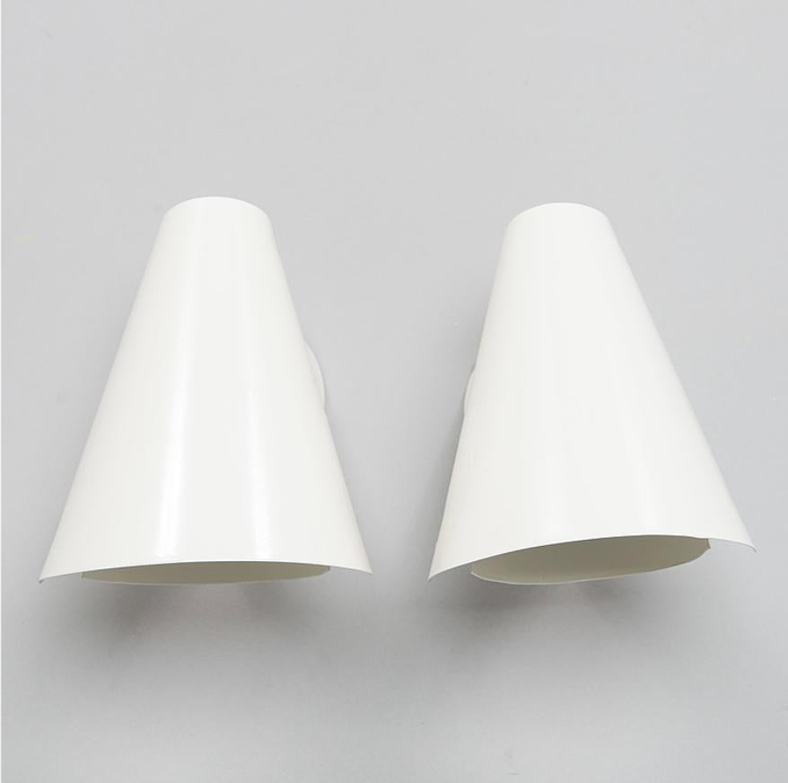 Finnish A pair of wall lights by Paavo Tynell, model 2351. For Sale