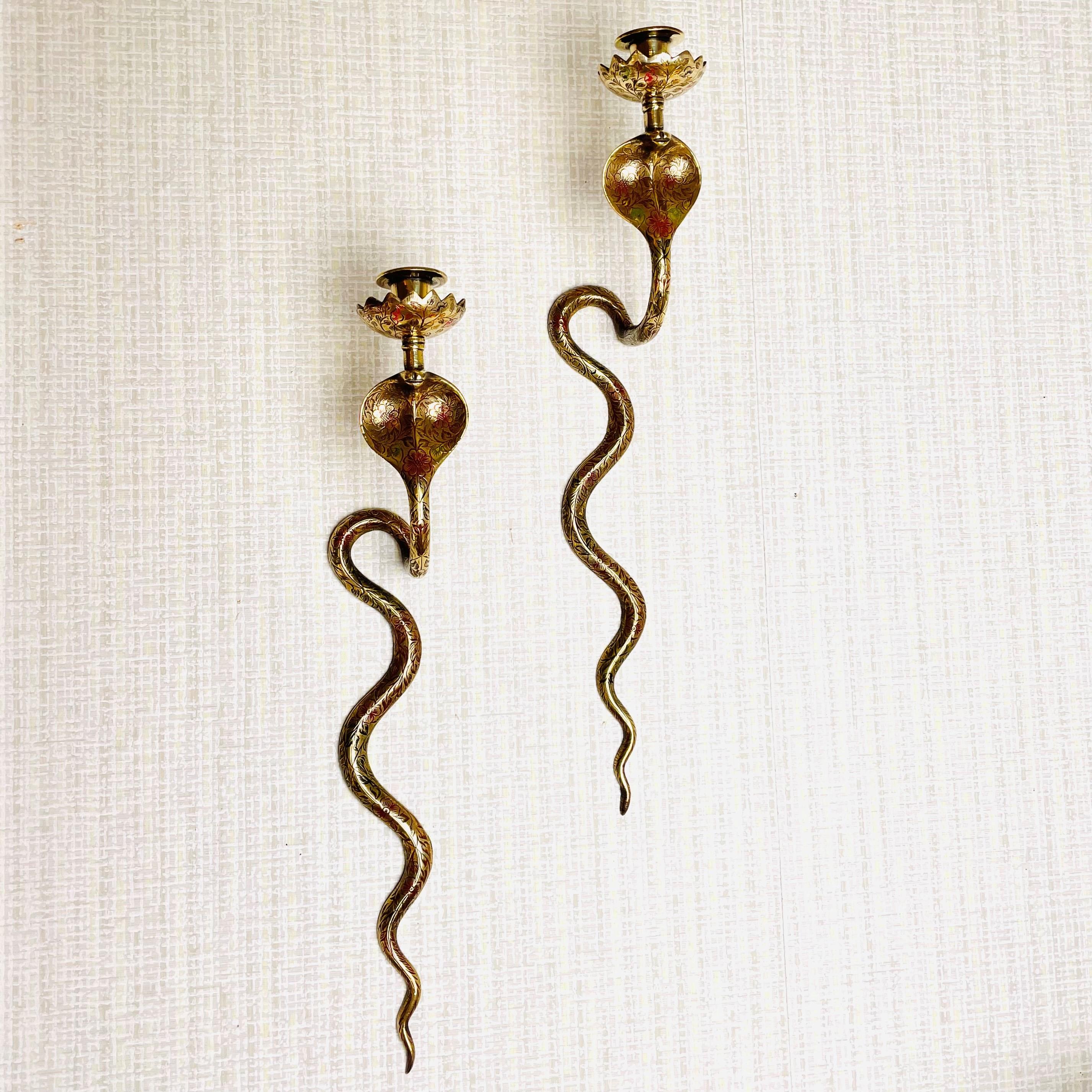 A pair of Wall Lights in the shape of a Cobra. Art Deco, 1920s-1930s. Scary but beautiful. Elegantly made in brass.

Wear consistent with age and use.