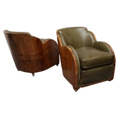 A Pair of Walnut and Green Leather Art Deco Lounge Chairs