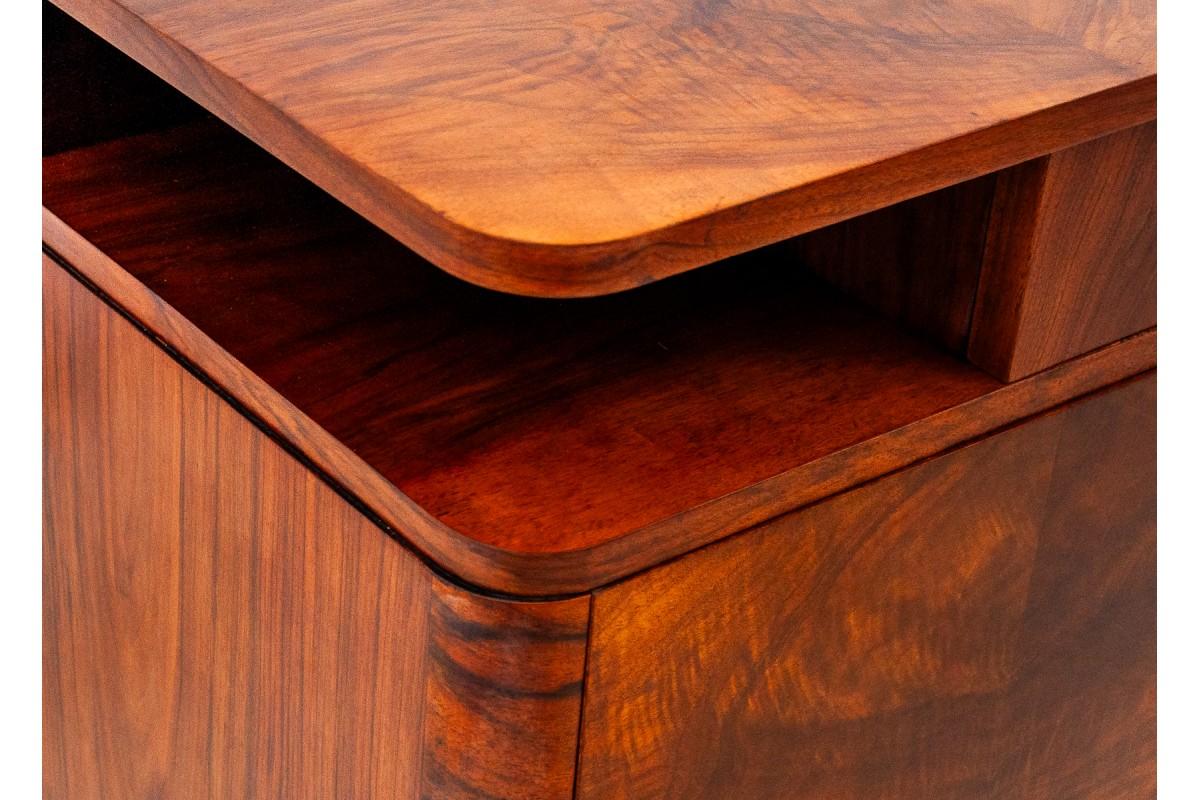 A pair of walnut bedside tables, Poland, 1950s. 6
