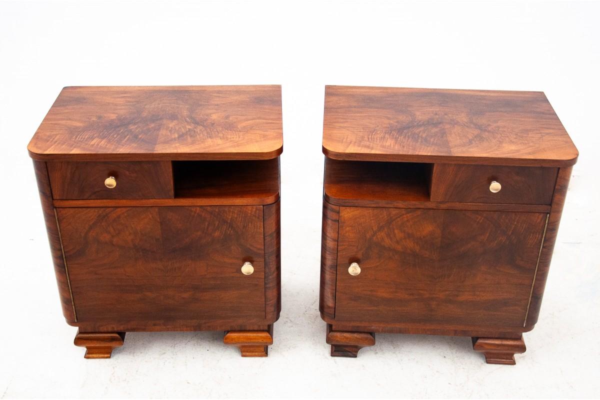 A pair of mid-20th century vintage bedside tables.

The tables have one drawer and a spacious cabinet, metal handles. Brown color. Very good condition, after professional renovation. We recommend.

Origin – Poland,

Wood – walnut,

Year – around