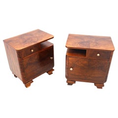 A pair of walnut bedside tables, Poland, 1950s.