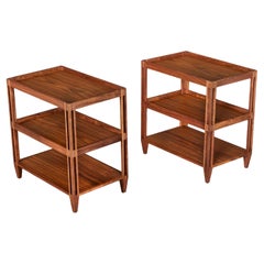 A Pair of Walnut Three Tier Etageres with Pierced Legs