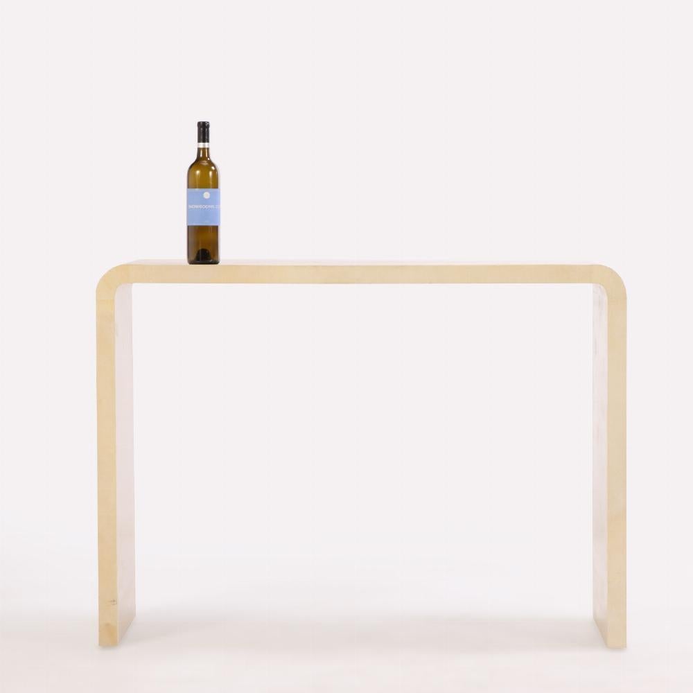 Mid-Century Modern A pair of waterfall console tables in the manner of Jean-Michel Frank. For Sale