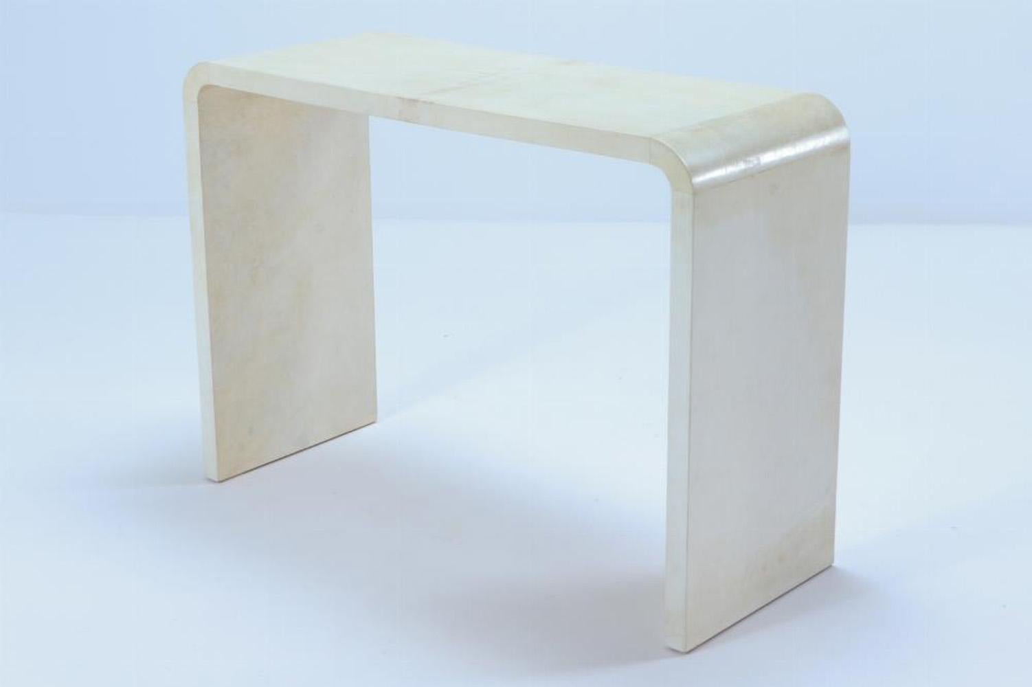 Argentine A pair of waterfall console tables in the manner of Jean-Michel Frank.