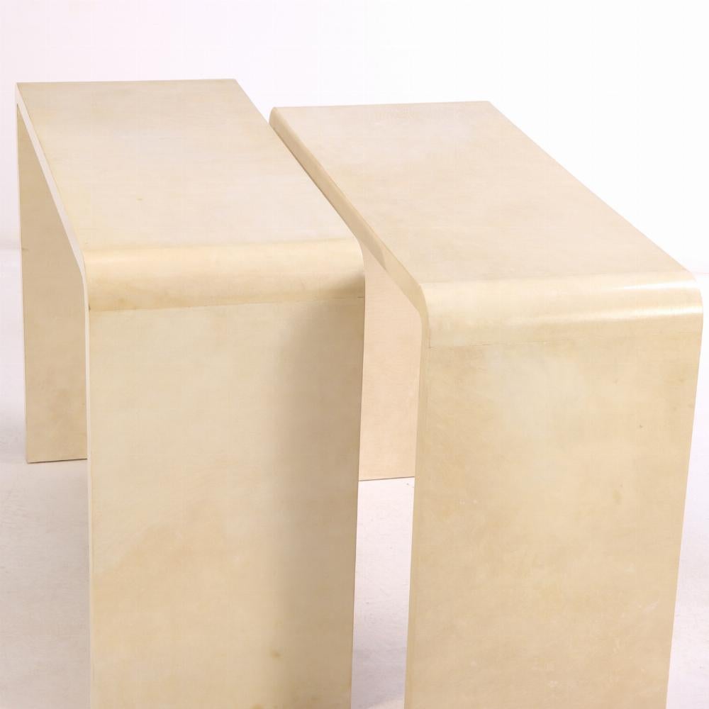 Argentine A pair of waterfall console tables in the manner of Jean-Michel Frank. For Sale