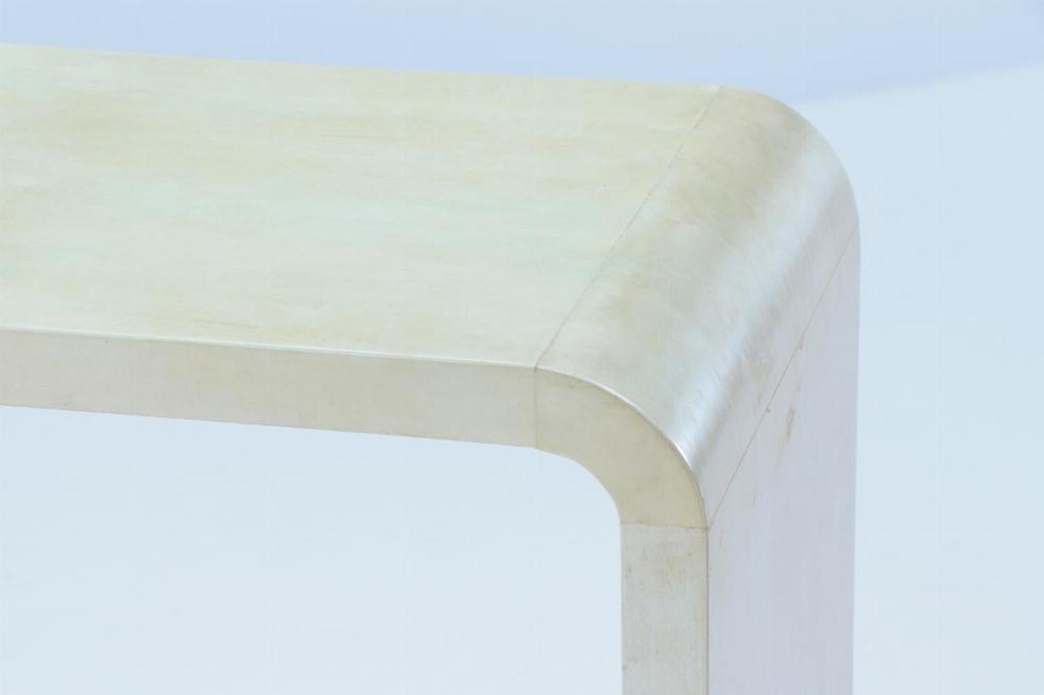Contemporary A pair of waterfall console tables in the manner of Jean-Michel Frank.