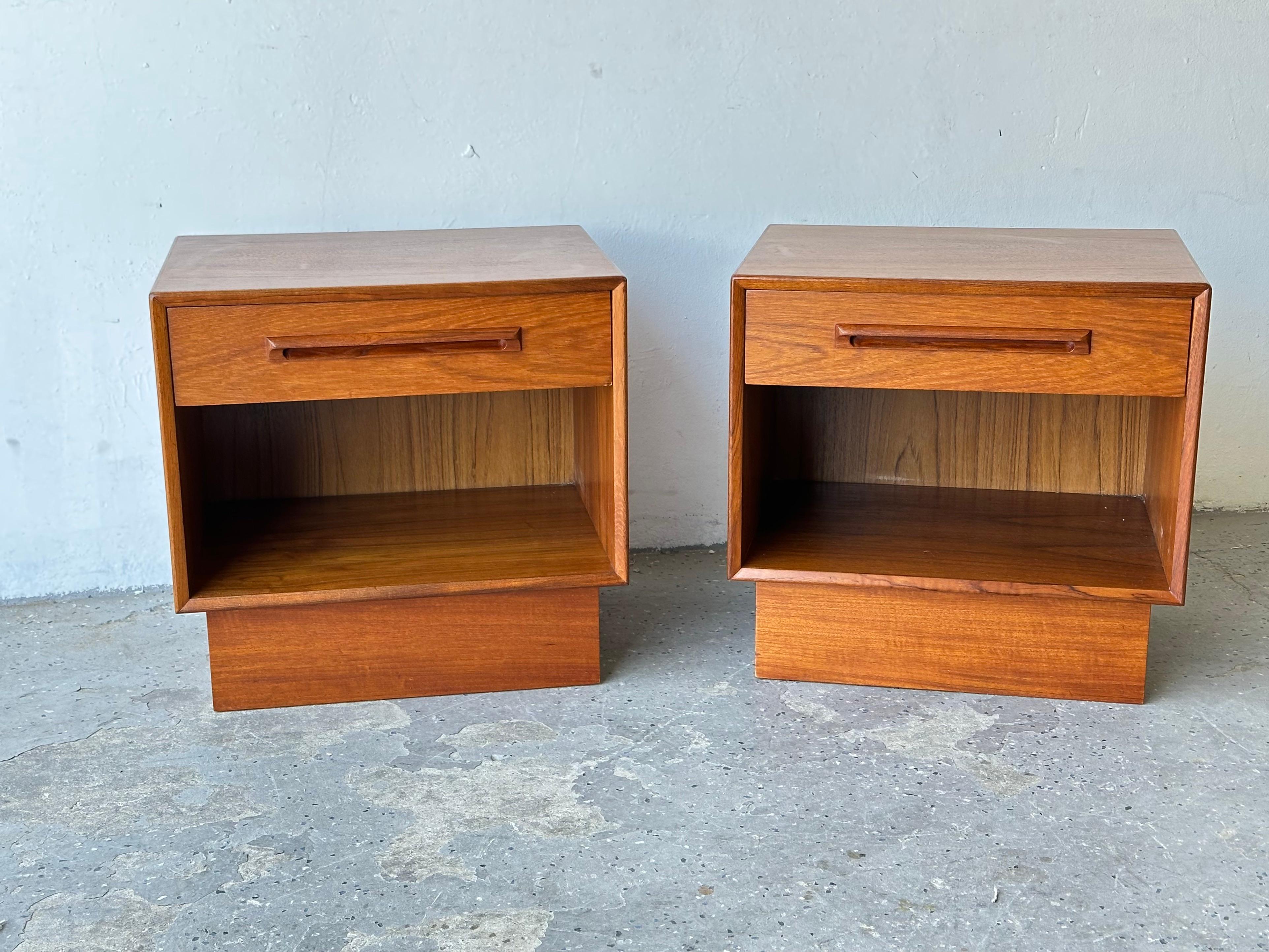 
A beautiful pair of nightstands or end tables by Westnofa of Norway. Beautiful teak veneer 

A single drawer up top, with a generous cubby space down below. Perfect for hiding all your bedside clutter. 

Drawers slide perfectly

Dimensions: