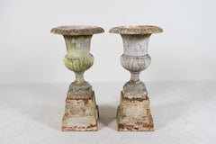 A Pair of White Cast Iron Urns with Bases, France c.1900
