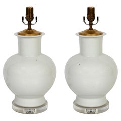 Pair of White Ceramic Chinese Export Lamps on Lucite Base