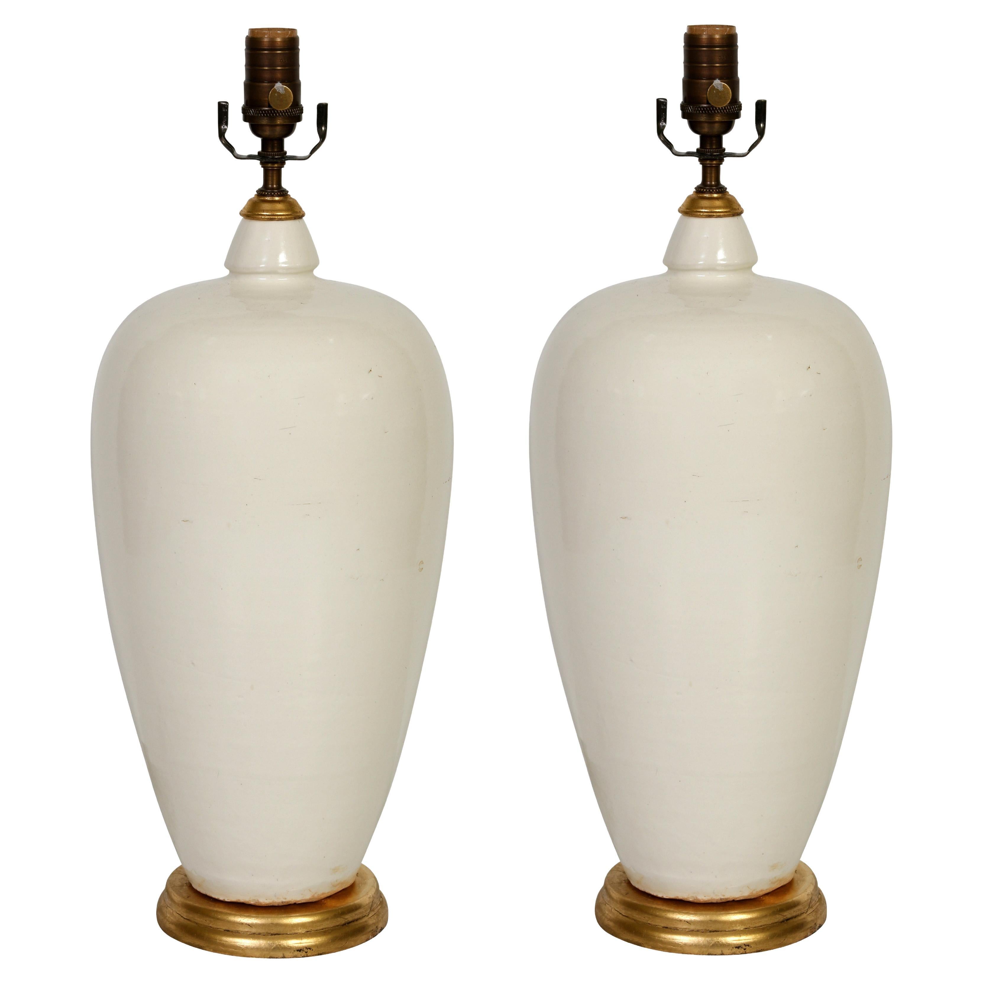 Pair of White Ceramic Lamps with Gold Base