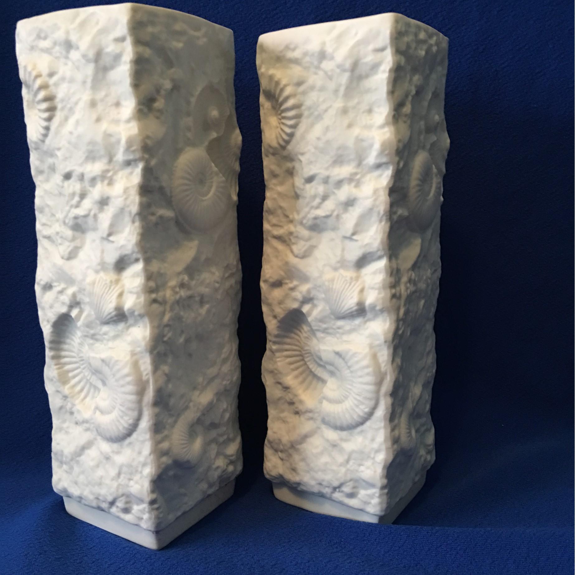 A lovely grand pair of white matte porcelain white fossil rock vases from the manufacture of Kaiser of Germany. Great looking set of attractive vases. Real eye catchers.