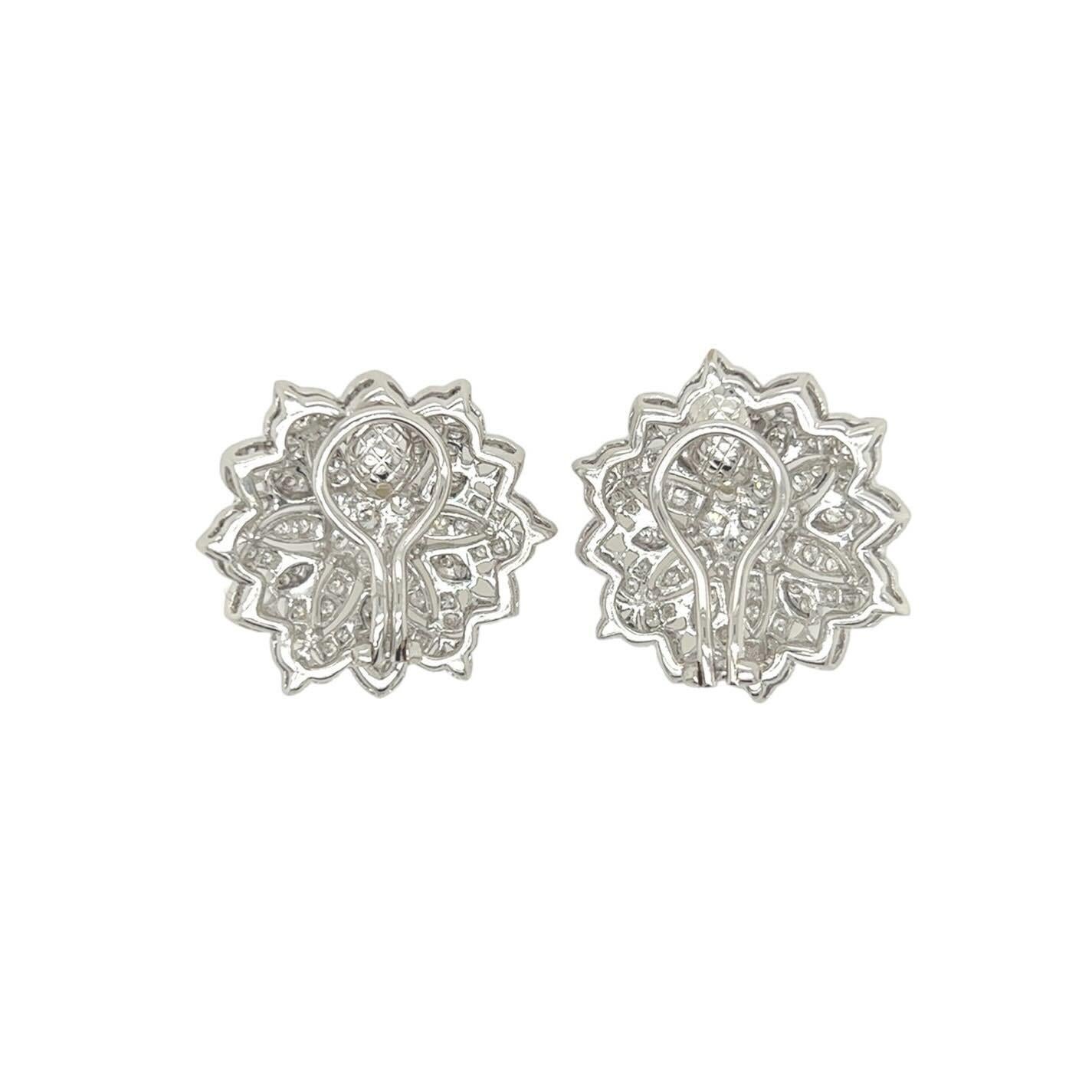 Round Cut A Pair of White Gold and Diamond Earrings For Sale