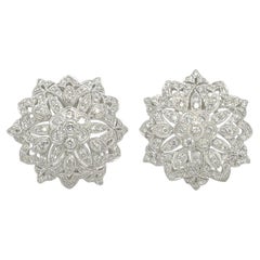 Paire de boucles d'oreilles en or blanc et diamants