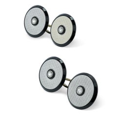 Coppia di gemelli in oro bianco, onice e diamanti, 1950 circa