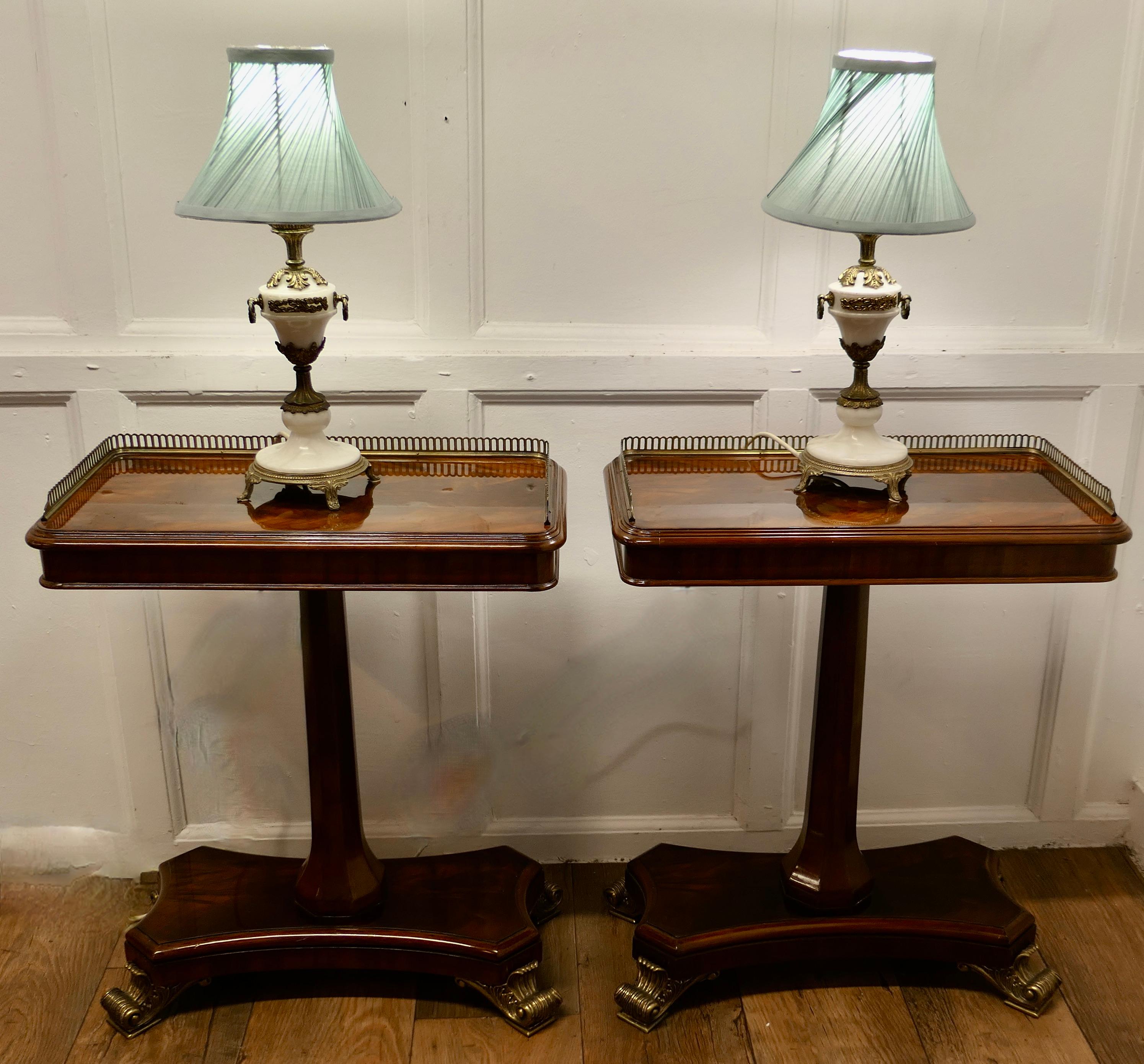 A Pair of White Marble and Ormolu Classical Greek Style Table Lamp

These are heavy little lamps made in solid marble with ormolu mounts,  the lamps are set on small feet with a bulbous pillar 
These lamps are in good condition with a very minor