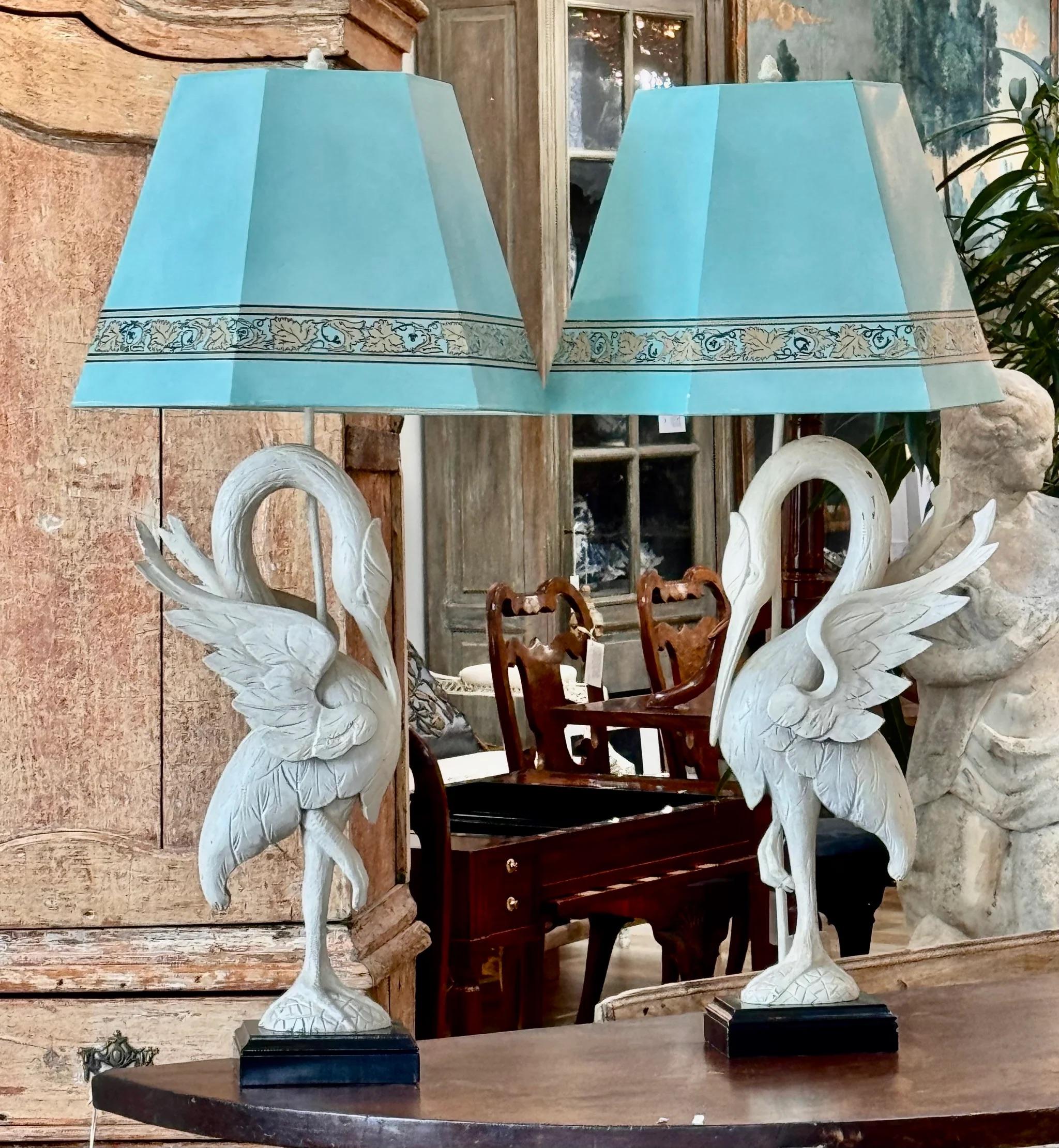 A Pair of delightful, tall White-Painted Carved Egret Lamps Mid-Century. Includes hand-made shades.

