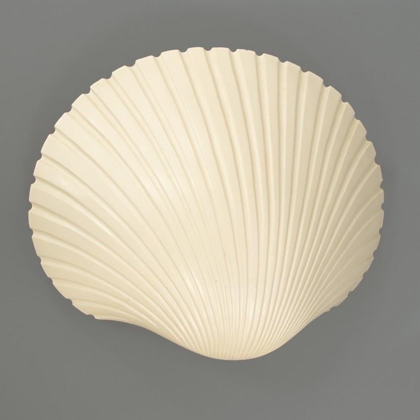 Rococo A pair of white seashell wall sconces by Michèle Mahé and André Cazenave, France For Sale