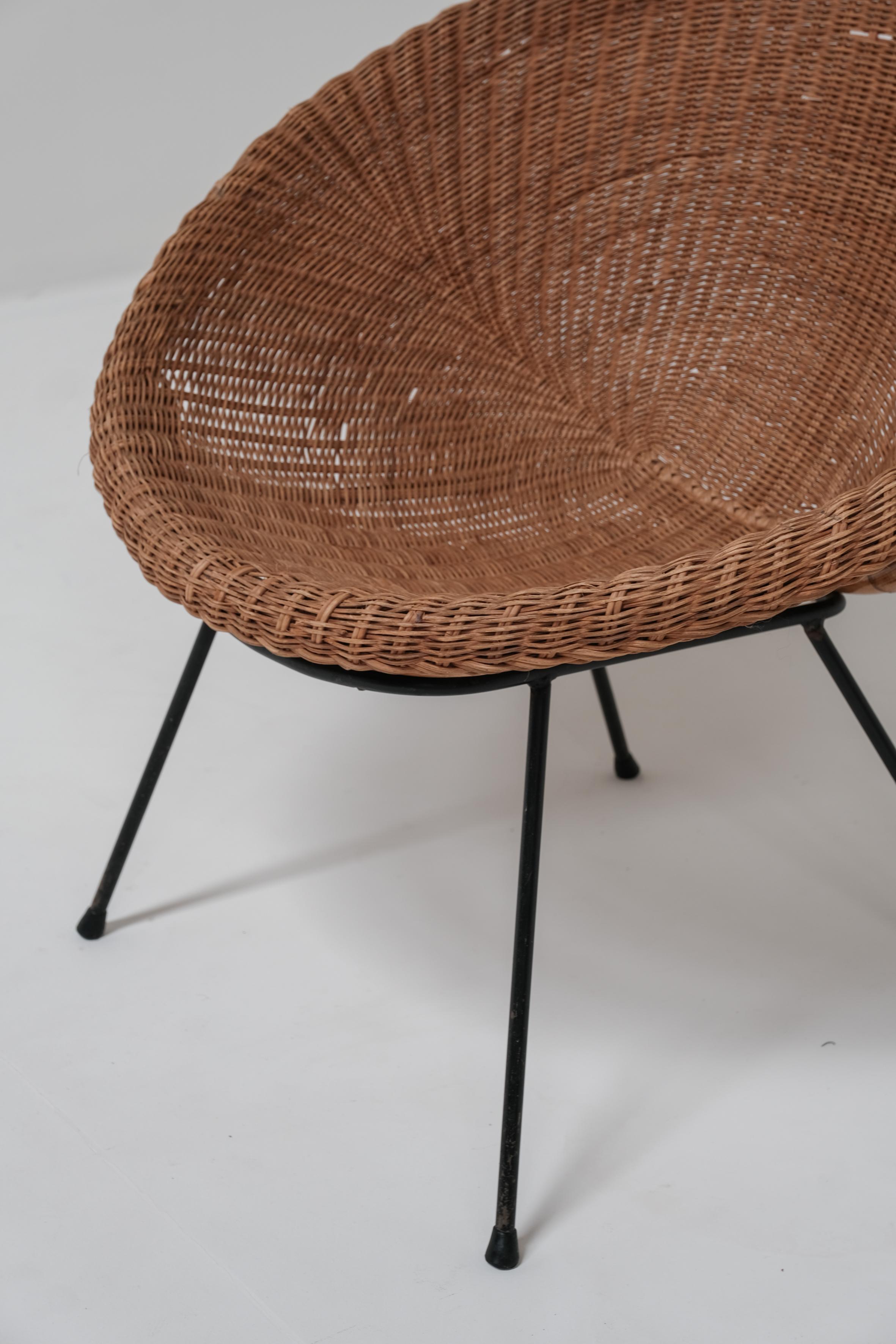 A pair of wicker bucket chairs 1970 3