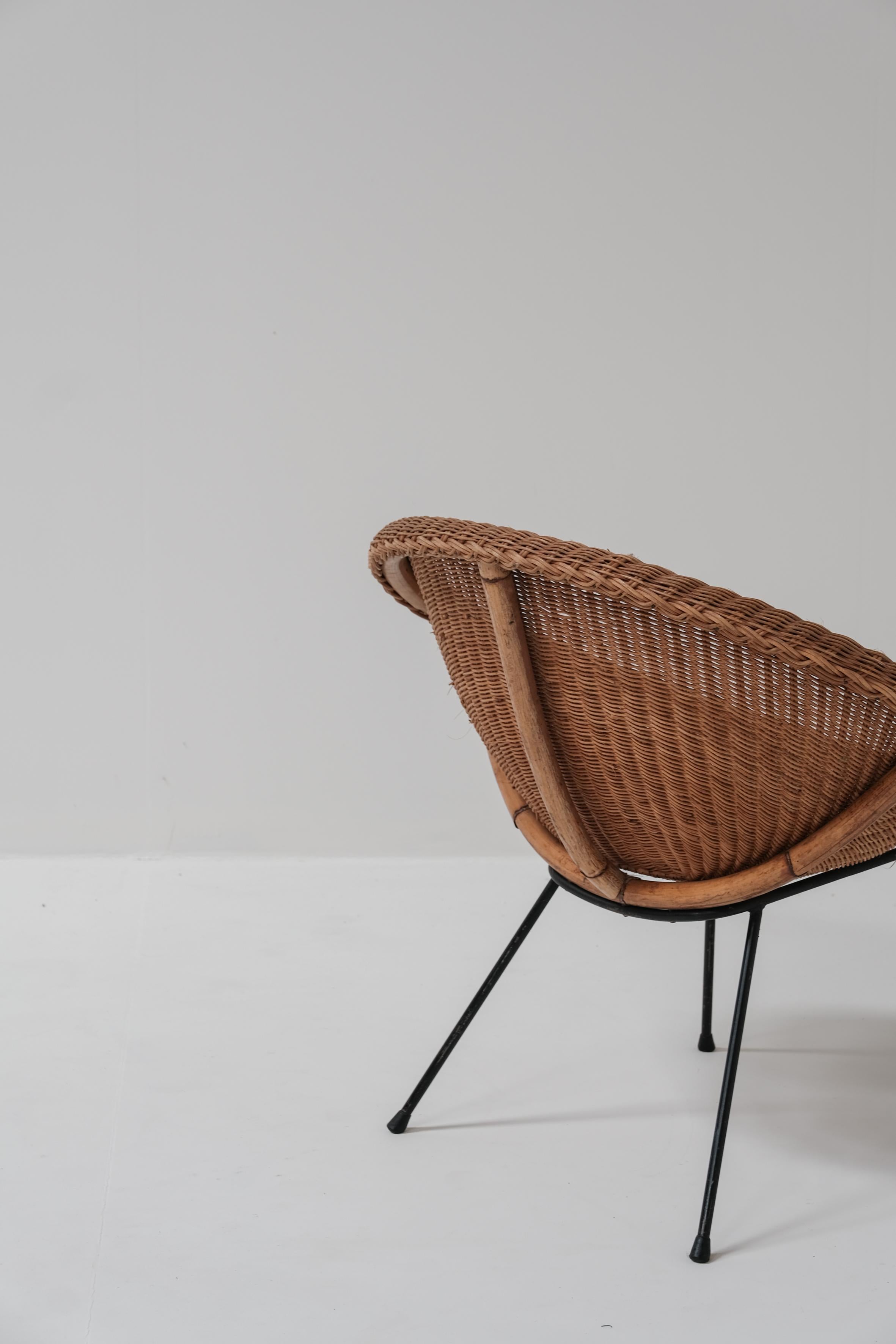 A pair of wicker bucket chairs 1970 5